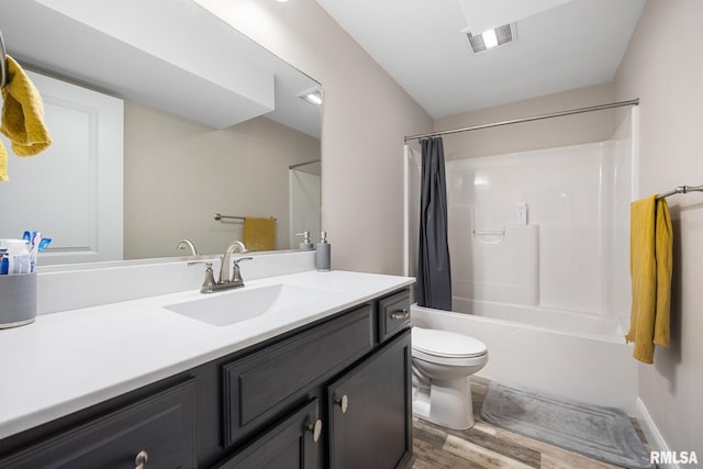 109 E Lee St, Tremont, IL 61568 - bathroom featuring vanity, wood finished floors, and shower / tub combo with curtain