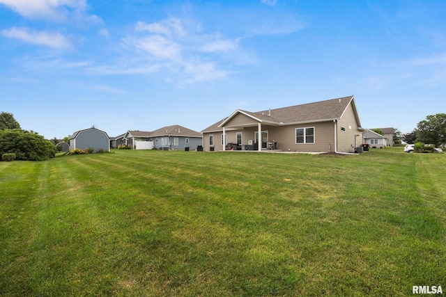 109 E Lee St, Tremont, IL 61568 - rear view of house featuring a patio and a yard