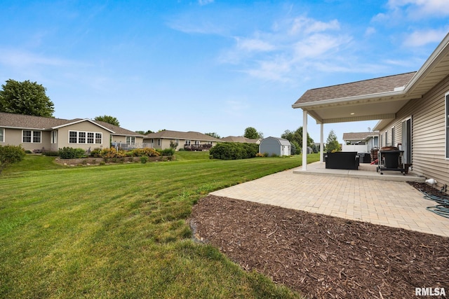 109 E Lee St, Tremont, IL 61568 - view of grassy yard featuring a patio area and a residential view