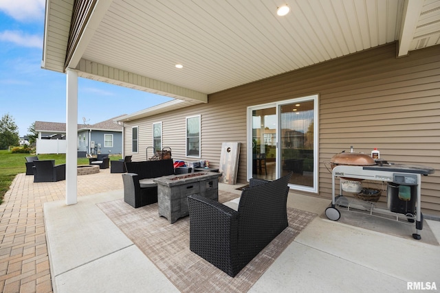 109 E Lee St, Tremont, IL 61568 - view of patio / terrace with an outdoor living space with a fire pit