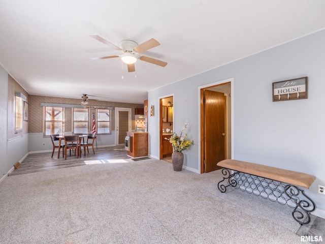 6334 Macs Rd, Manito, IL 61546 - carpeted living area with ceiling fan and baseboards