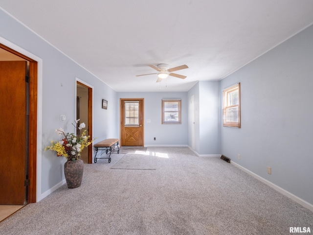 6334 Macs Rd, Manito, IL 61546 - carpeted empty room featuring a ceiling fan and baseboards