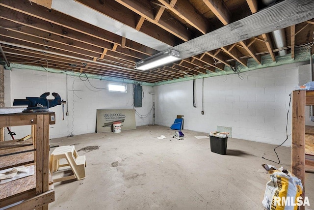 14100 Glasford-Canton Rd, Glasford, IL 61533 - below grade area featuring electric panel and concrete block wall