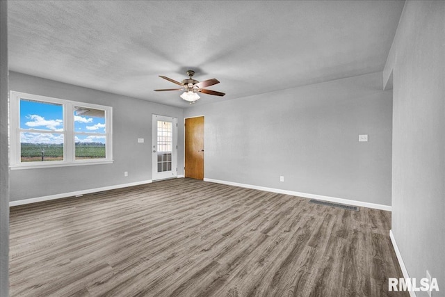 14100 Glasford-Canton Rd, Glasford, IL 61533 - spare room with wood finished floors and ceiling fan