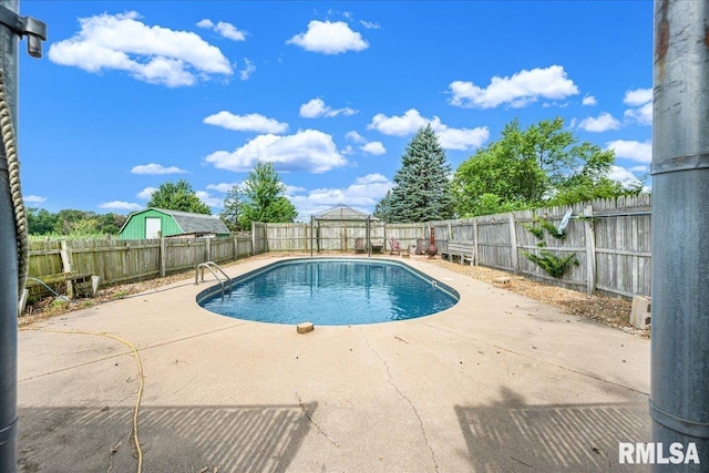 14100 Glasford-Canton Rd, Glasford, IL 61533 - view of swimming pool featuring a patio area and a fenced backyard
