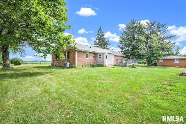 14100 Glasford-Canton Rd, Glasford, IL 61533 - view of grassy yard featuring a deck