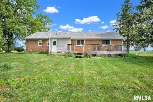 14100 Glasford-Canton Rd, Glasford, IL 61533 - back of house featuring brick siding, a deck, and a lawn