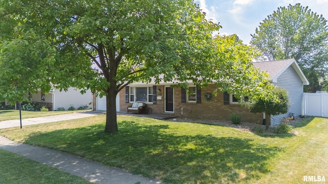 1100 Hampton Rd, Washington, IL 61571 - view of front of property with concrete driveway, a garage, and brick siding