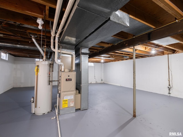 1100 Hampton Rd, Washington, IL 61571 - below grade area featuring gas water heater and heating unit