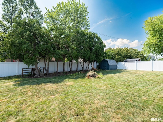 1100 Hampton Rd, Washington, IL 61571 - fenced backyard with a storage unit