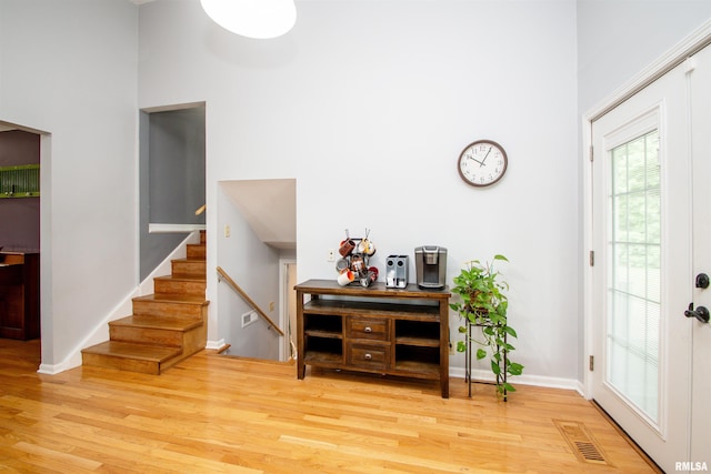 499 Goodsill Dr, East Galesburg, IL 61430 - foyer featuring a high ceiling, wood finished floors, and stairs