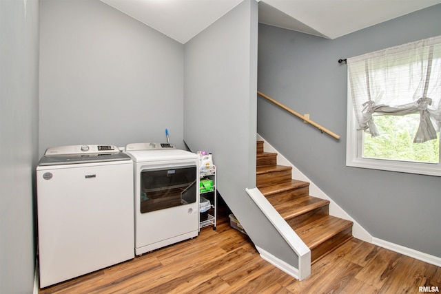 499 Goodsill Dr, East Galesburg, IL 61430 - washroom with washer and clothes dryer and light wood-style floors