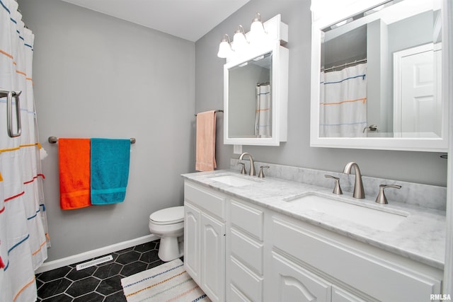 499 Goodsill Dr, East Galesburg, IL 61430 - bathroom featuring double vanity and tile patterned floors