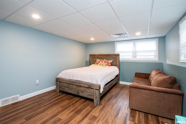 499 Goodsill Dr, East Galesburg, IL 61430 - bedroom with wood finished floors and a paneled ceiling
