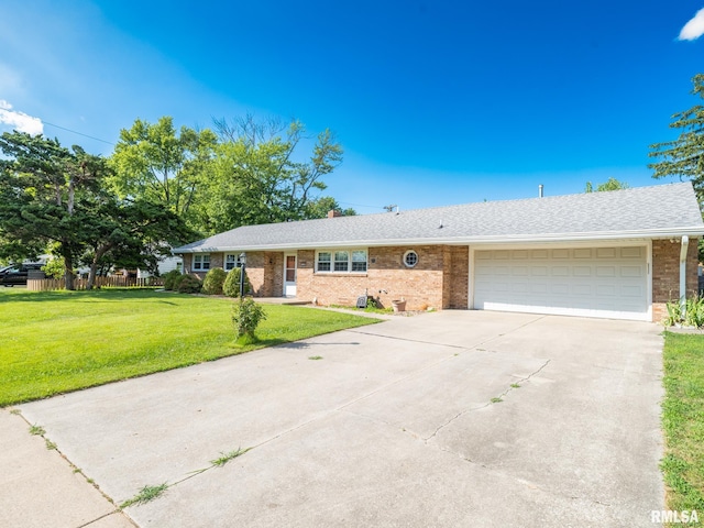 204 Ivanhoe Way, Bloomington, IL 61701 - ranch-style house with brick siding, driveway, and an attached garage