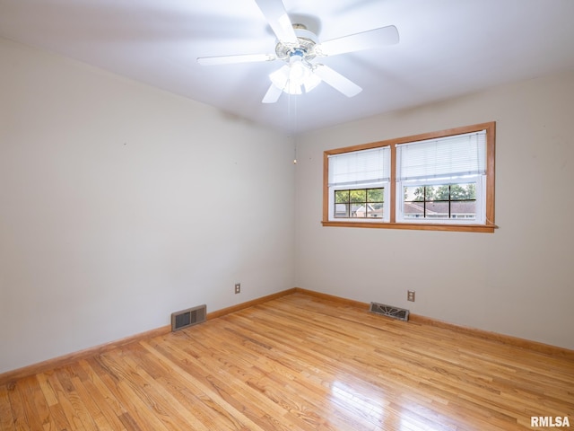 204 Ivanhoe Way, Bloomington, IL 61701 - empty room featuring wood finished floors and ceiling fan