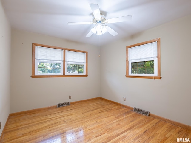 204 Ivanhoe Way, Bloomington, IL 61701 - empty room featuring light wood-style flooring and ceiling fan