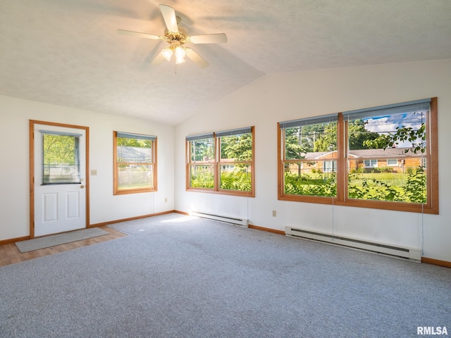 204 Ivanhoe Way, Bloomington, IL 61701 - spare room featuring baseboard heating, healthy amount of natural light, carpet, and lofted ceiling