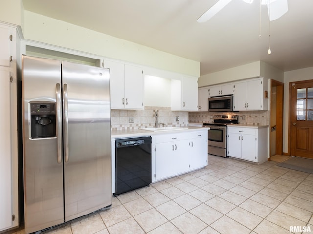 204 Ivanhoe Way, Bloomington, IL 61701 - kitchen featuring stainless steel appliances, light countertops, decorative backsplash, and white cabinetry