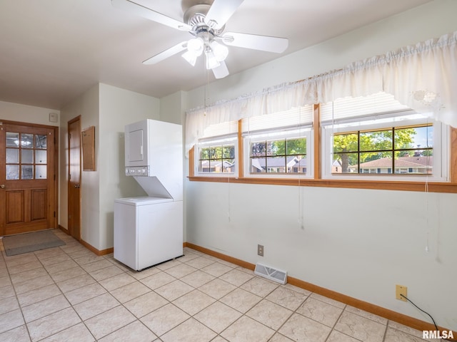 204 Ivanhoe Way, Bloomington, IL 61701 - laundry room with estacked washer and dryer, light tile patterned floors, and ceiling fan