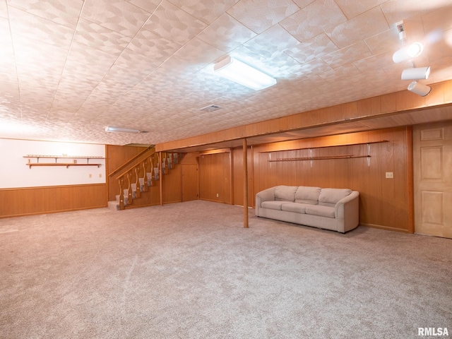 204 Ivanhoe Way, Bloomington, IL 61701 - finished basement featuring wooden walls, carpet floors, and stairs
