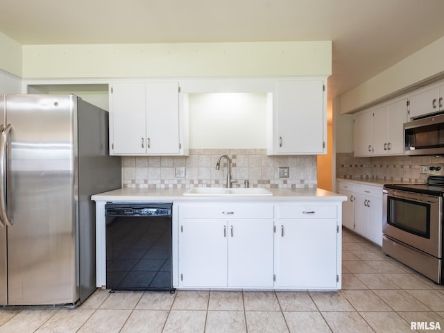 204 Ivanhoe Way, Bloomington, IL 61701 - kitchen featuring stainless steel appliances, light countertops, backsplash, and white cabinetry