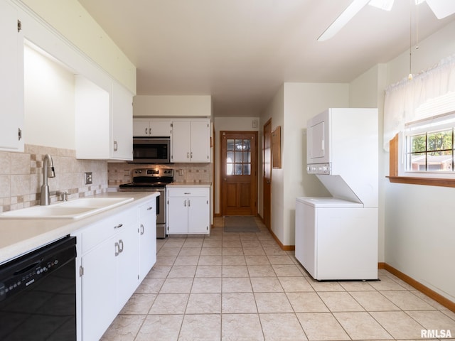 204 Ivanhoe Way, Bloomington, IL 61701 - kitchen featuring stainless steel appliances, stacked washer / drying machine, light countertops, tasteful backsplash, and white cabinetry