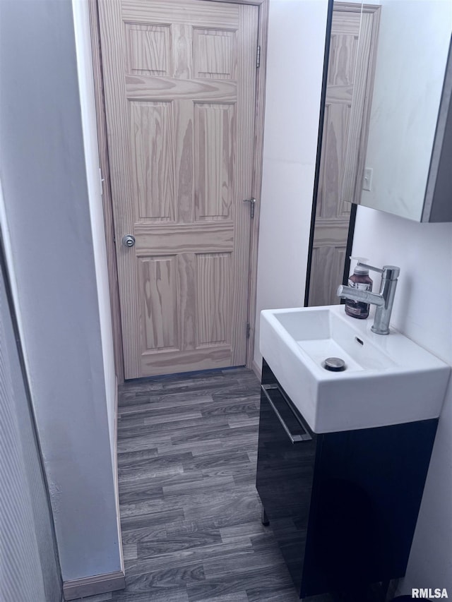 1807 N 5th St, Chillicothe, IL 61523 - bathroom featuring vanity and wood finished floors