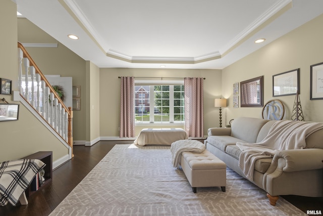 10615 N Collett Rd, Peoria, IL 61615 - living area with crown molding, a tray ceiling, recessed lighting, stairs, and dark wood-style flooring