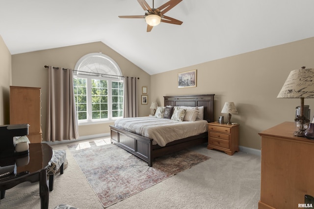 10615 N Collett Rd, Peoria, IL 61615 - bedroom featuring light colored carpet, vaulted ceiling, and ceiling fan