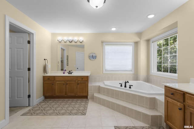 10615 N Collett Rd, Peoria, IL 61615 - bathroom with vanity, a bath, and tile patterned flooring