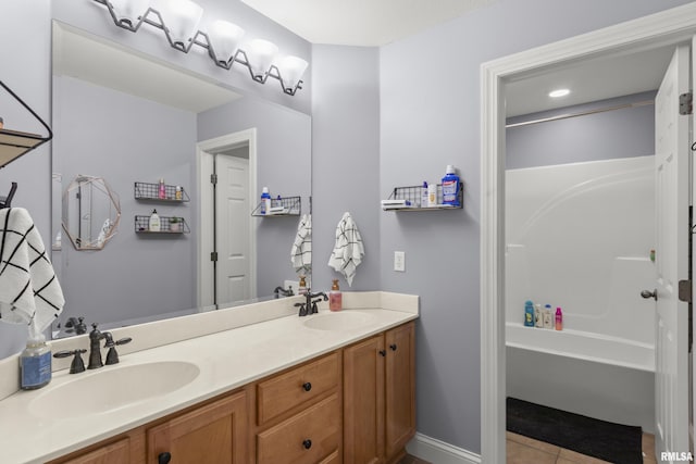 10615 N Collett Rd, Peoria, IL 61615 - bathroom with double vanity, tile patterned floors, and  shower combination