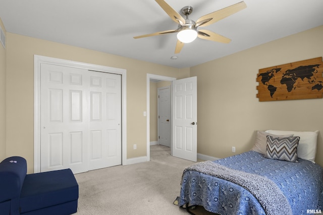 10615 N Collett Rd, Peoria, IL 61615 - bedroom featuring light carpet, a closet, and ceiling fan