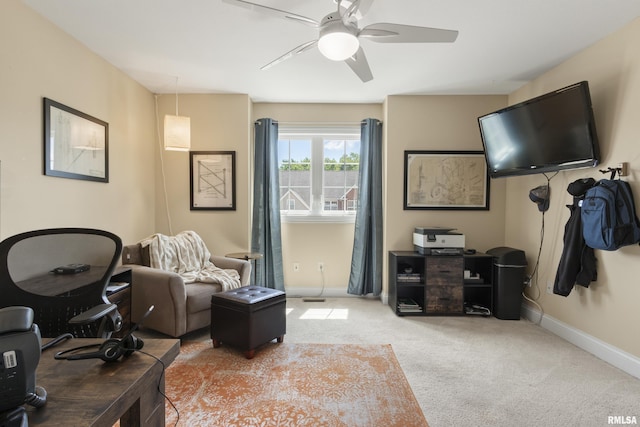 10615 N Collett Rd, Peoria, IL 61615 - living room featuring a ceiling fan and carpet