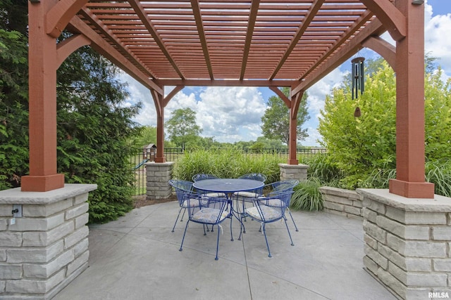 10615 N Collett Rd, Peoria, IL 61615 - view of patio with outdoor dining space and a pergola