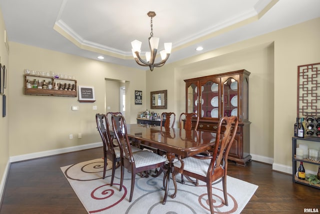 10615 N Collett Rd, Peoria, IL 61615 - dining area featuring a tray ceiling, ornamental molding, a chandelier, dark wood-style floors, and recessed lighting