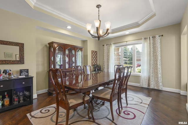 10615 N Collett Rd, Peoria, IL 61615 - dining space with a tray ceiling, a chandelier, crown molding, wood finished floors, and recessed lighting