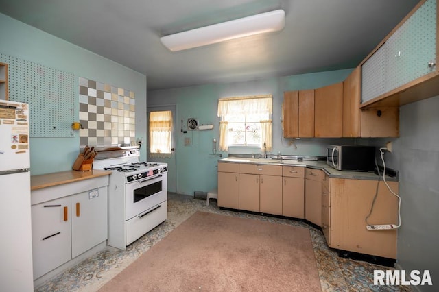 1425 Arthur St, Pekin, IL 61554 - kitchen featuring white appliances and light countertops