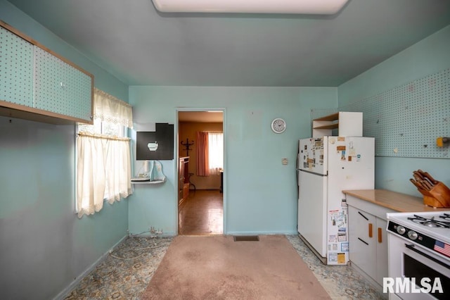 1425 Arthur St, Pekin, IL 61554 - kitchen featuring white appliances and baseboards