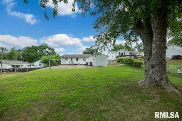 1425 Arthur St, Pekin, IL 61554 - view of yard featuring a storage unit