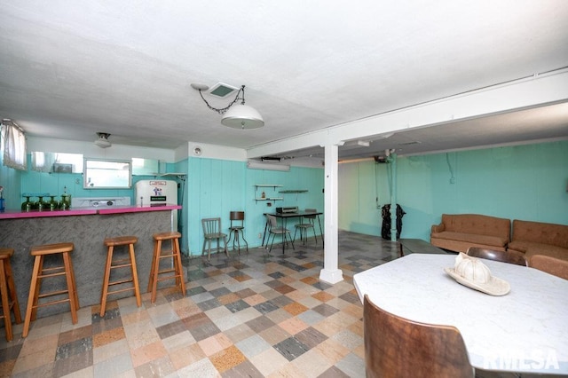 1425 Arthur St, Pekin, IL 61554 - living room featuring tile patterned floors and bar area
