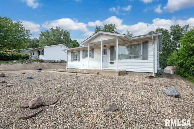 1425 Arthur St, Pekin, IL 61554 - view of front facade featuring a porch