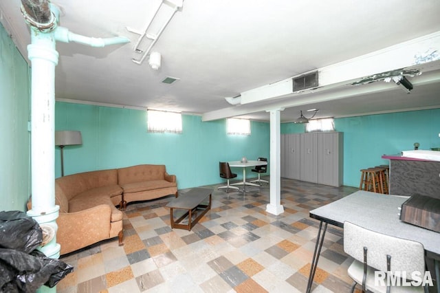 1425 Arthur St, Pekin, IL 61554 - living room with tile patterned floors and ornate columns