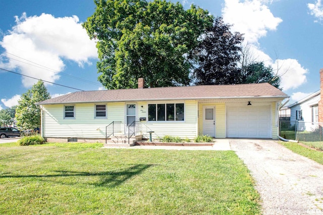 416 W Maple St, Chillicothe, IL 61523 - ranch-style house featuring a garage, asphalt driveway, and a chimney