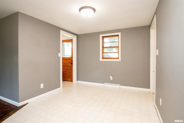 416 W Maple St, Chillicothe, IL 61523 - unfurnished room featuring baseboards and tile patterned floors