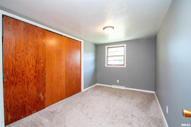 416 W Maple St, Chillicothe, IL 61523 - unfurnished bedroom featuring a closet and carpet