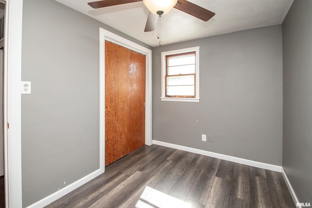 416 W Maple St, Chillicothe, IL 61523 - unfurnished bedroom with wood finished floors, a closet, and a ceiling fan