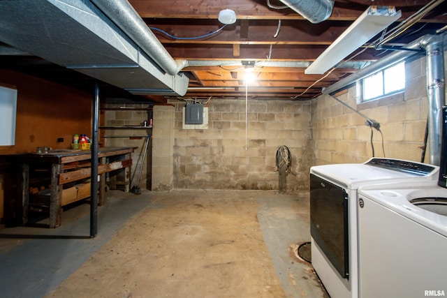 416 W Maple St, Chillicothe, IL 61523 - below grade area featuring washer and dryer, a workshop area, and electric panel
