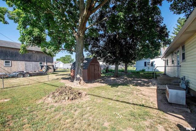 416 W Maple St, Chillicothe, IL 61523 - fenced backyard featuring a storage unit