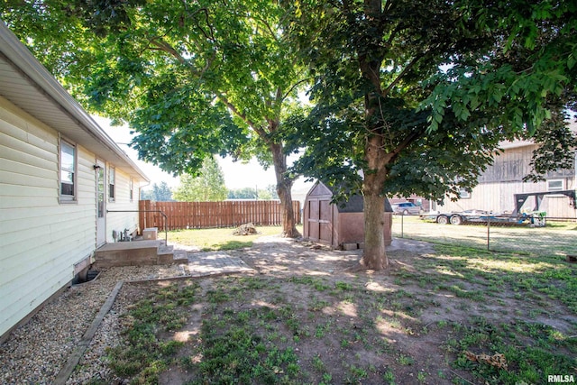 416 W Maple St, Chillicothe, IL 61523 - fenced backyard featuring a storage unit